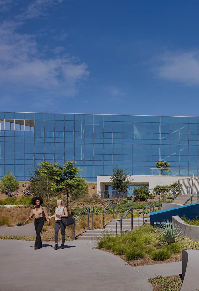 Outdoor walkway with greenery on one of the top floors of 20 Massachusetts Avenue in Washington D.C. The building is owned by OPI and is LEED Gold and WELL Certified.